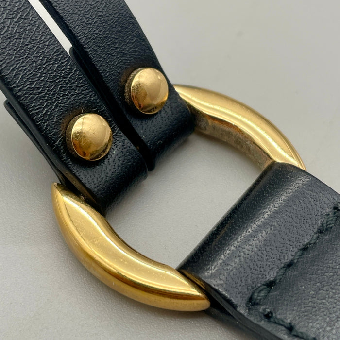 Bracciale Trussardi pelle nera e metalleria oro 1990 ca