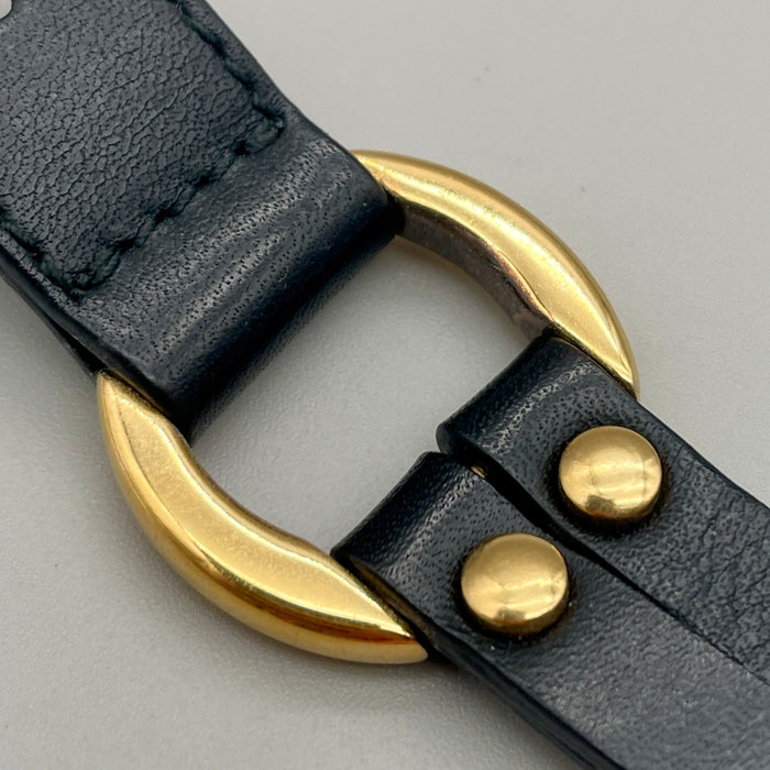 Bracciale Trussardi pelle nera e metalleria oro 1990 ca