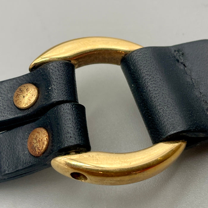 Bracciale Trussardi pelle nera e metalleria oro 1990 ca