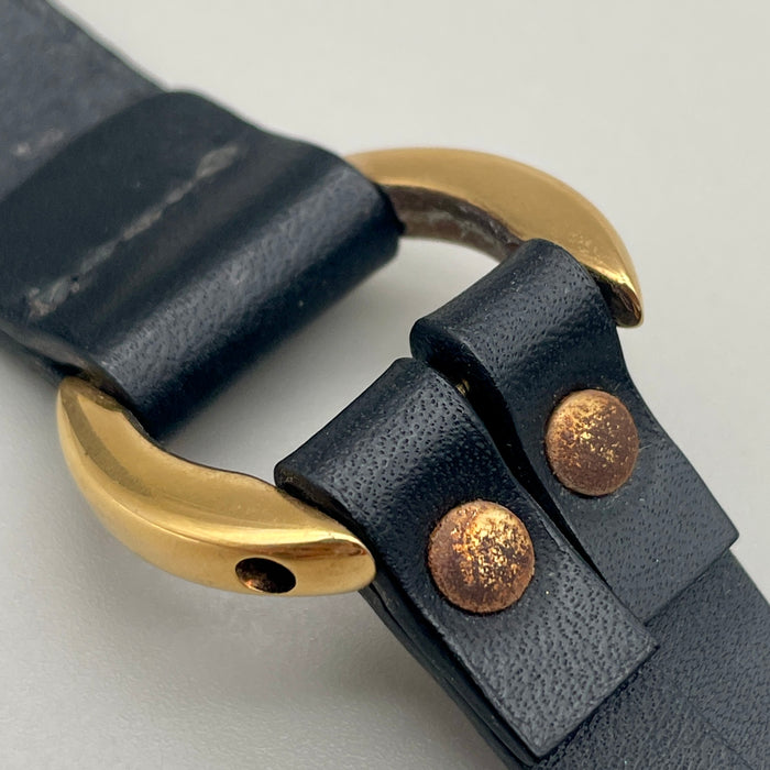 Bracciale Trussardi pelle nera e metalleria oro 1990 ca