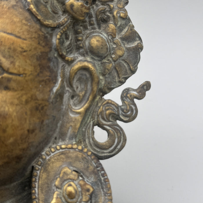 Maschera bronzo volto Dakini apotropaica Tibet XX sec.