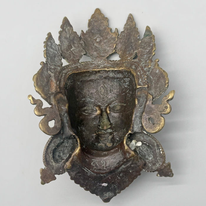 Maschera bronzo volto Dakini apotropaica Tibet XX sec.