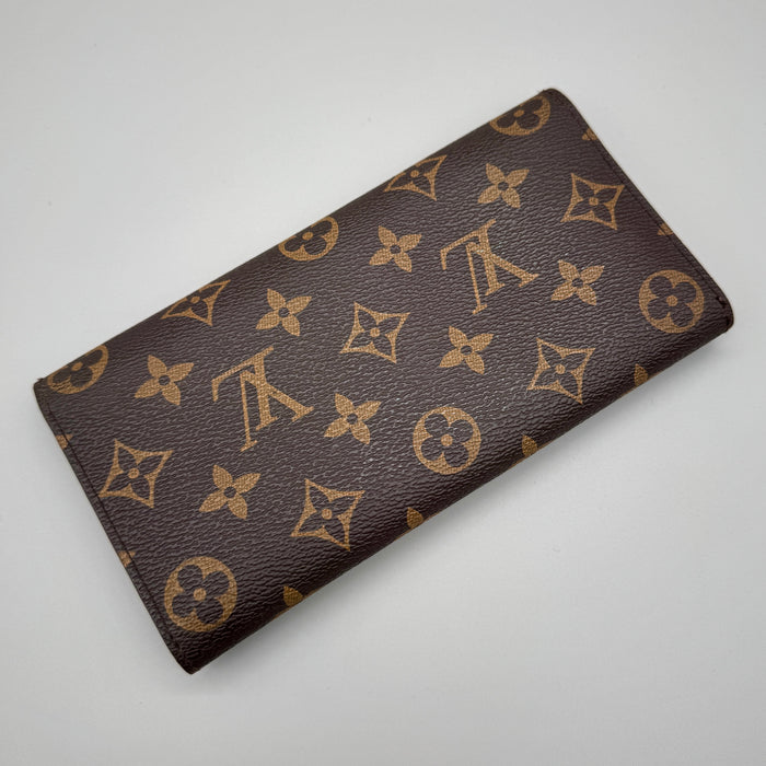Louis Vuitton "Emilie" portafoglio a busta fucsia monogram tela 2010 ca