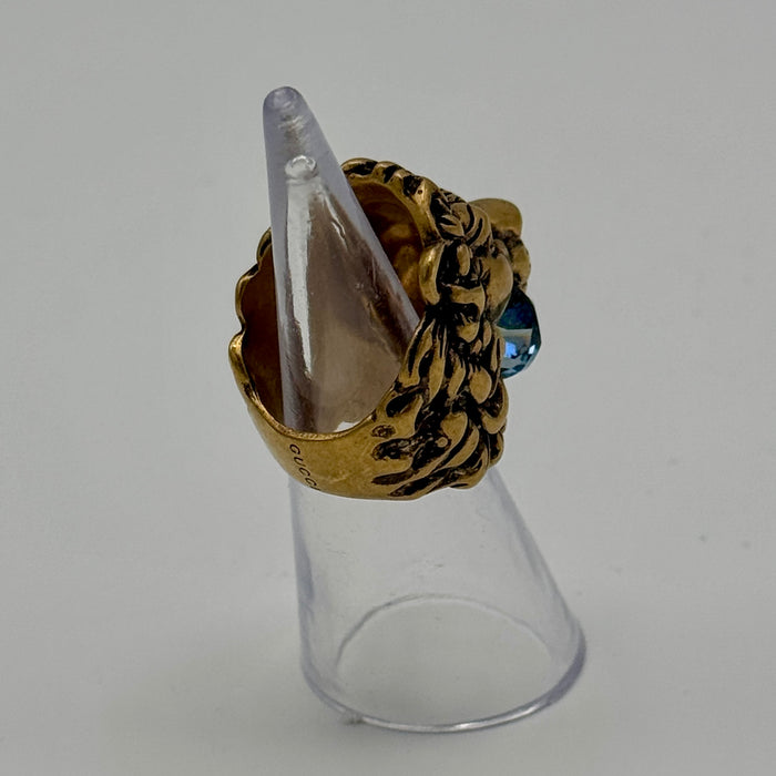 Gucci anello mod. Testa Leone metallo dorato con pietra azzurra 2020 ca