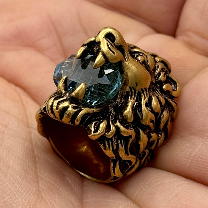Gucci anello mod. Testa Leone metallo dorato con pietra azzurra 2020 ca