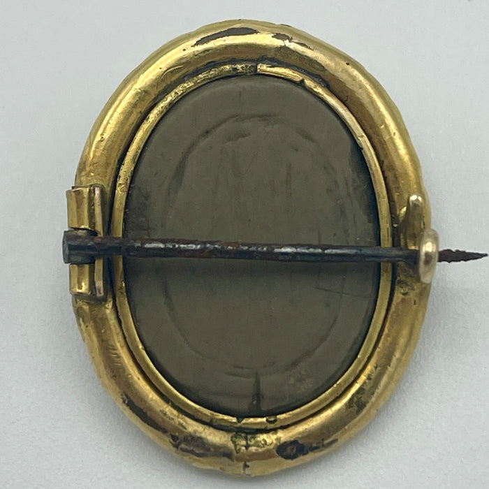 Cammeo figura femminile pietra lavica montatura dorata Italia 1920 ca