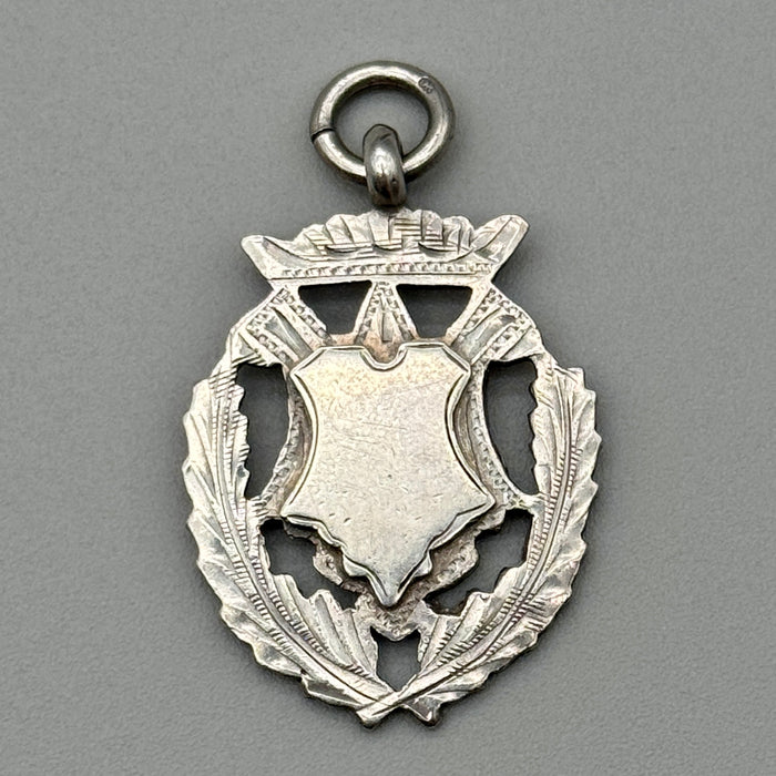 Medaglia da orologio argento sterling Watch Fob W.H.H. 1920 ca