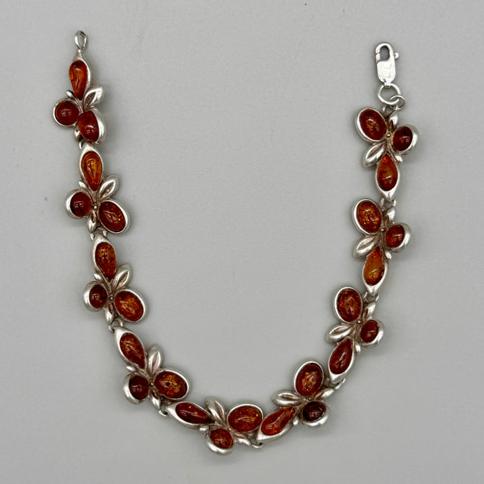 Bracciale in ambra ed argento 925 decorazioni floreali Italia 1990 ca