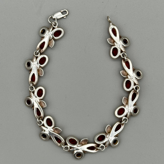 Bracciale in ambra ed argento 925 decorazioni floreali Italia 1990 ca