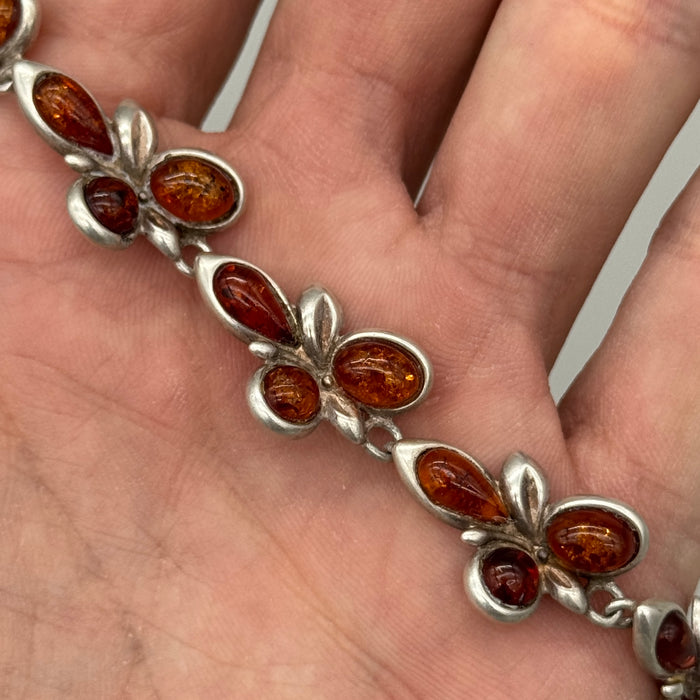 Bracciale in ambra ed argento 925 decorazioni floreali Italia 1990 ca