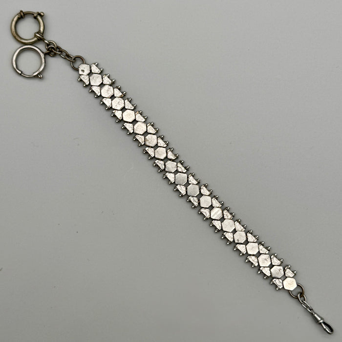 Catena orologio tasca metallo maglia esagonale lavorata Italia 1950 ca