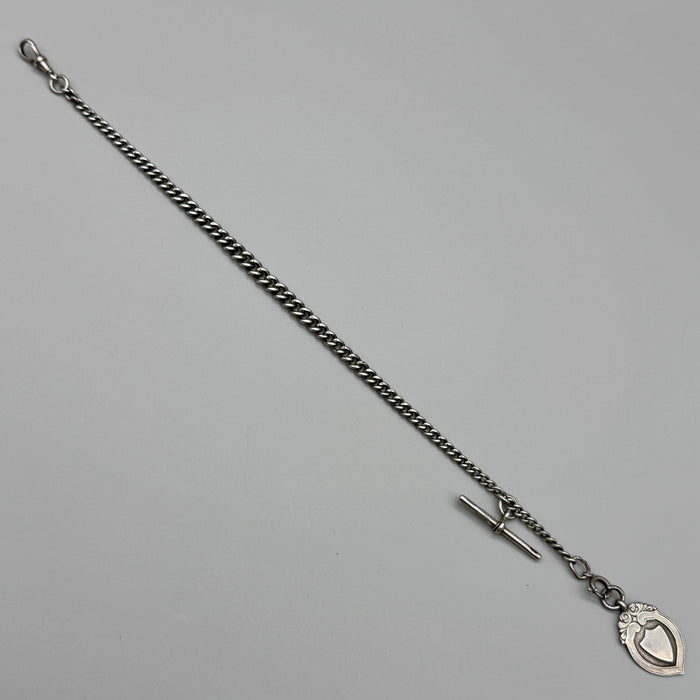 Catena orologio tasca argento con medaglia Vittoriana Regno Unito fine XIX sec.