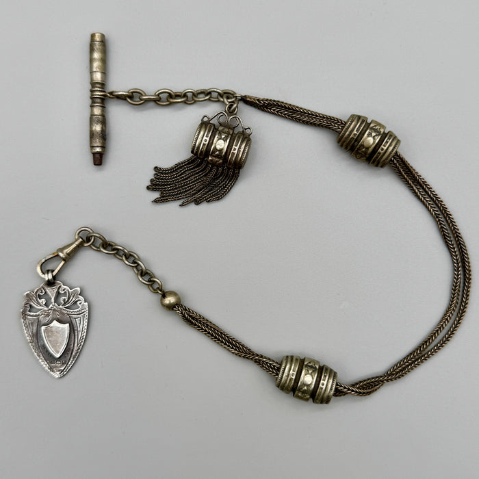 Catena orologio tasca argento nappa con medaglia Vittoriana Regno Unito fine XIX sec.