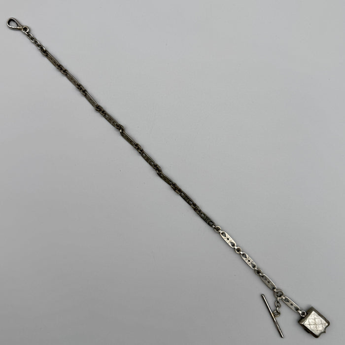 Catena orologio tasca argentata art deco con porta ritratti Francia 1920 ca