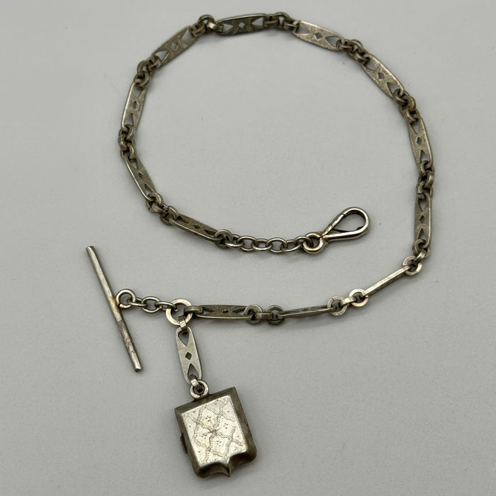Catena orologio tasca argentata art deco con porta ritratti Francia 1920 ca