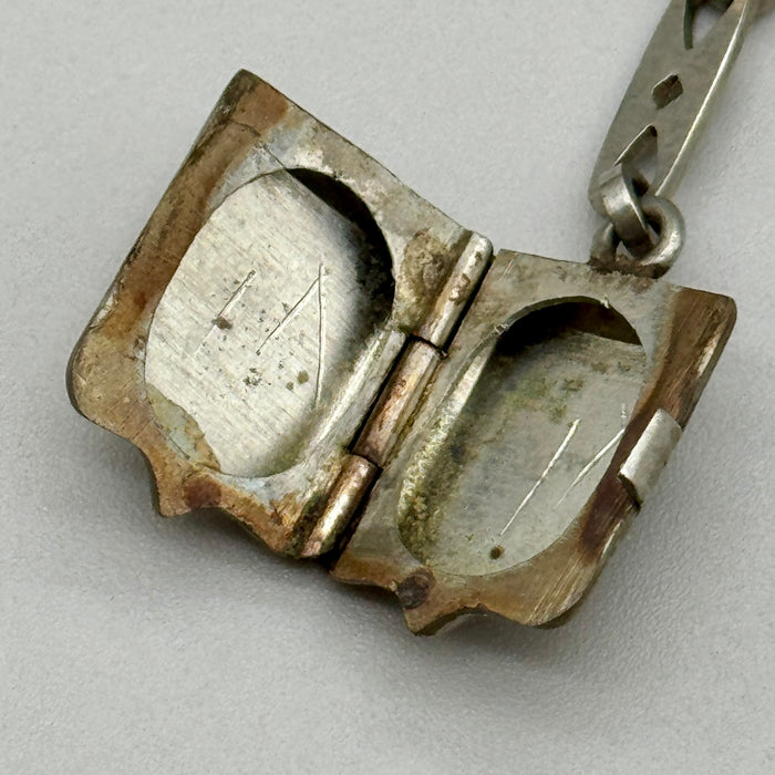 Catena orologio tasca argentata art deco con porta ritratti Francia 1920 ca