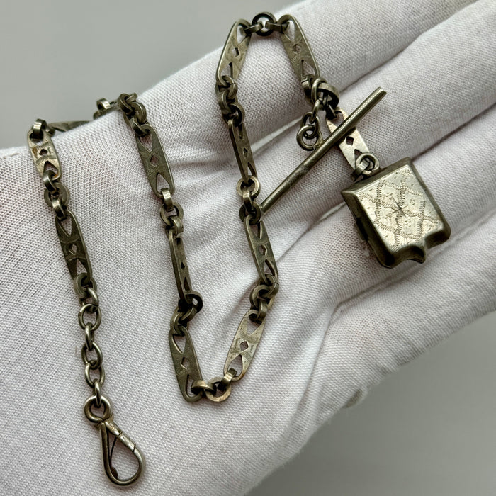 Catena orologio tasca argentata art deco con porta ritratti Francia 1920 ca