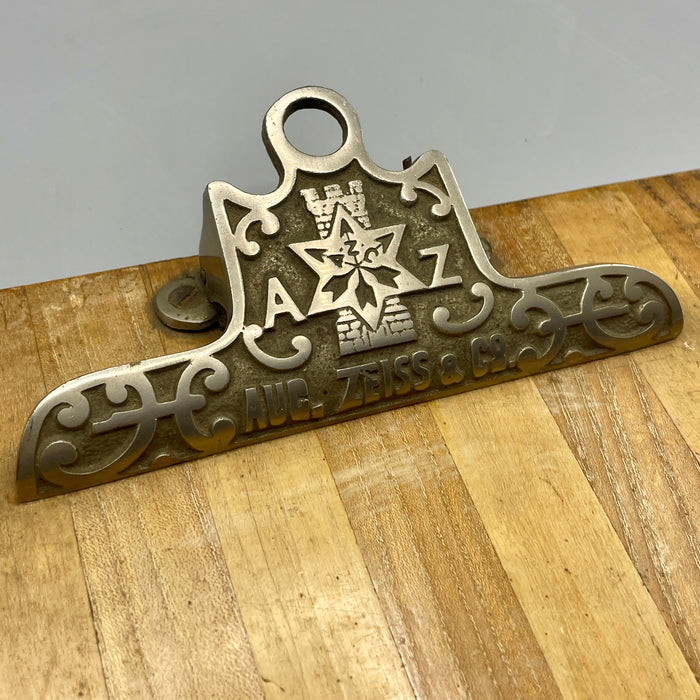 Aug. Zeiss & Co. cartellina con pinza fermacarte pubblicitaria d'epoca inizio XX sec.